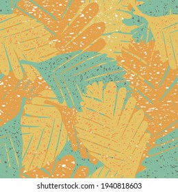 Abstract paint spatter tropical leaves seamless vector pattern background. Painterly backdrop with textured speckled overlapping layered foliage. Tropical yellow, orange, light blue botanical repeat