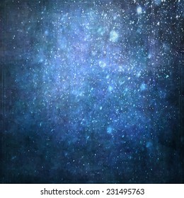 Abstract painted blue background with grunge texture and falling snow lighting effect.