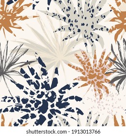 Abstract palm leaves filled with animal print. Modern trendy tropical seamless pattern. Exotic foliage background with rough texture for textile, fabric, print design