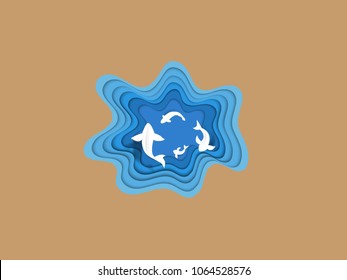 abstract paper cut with white fish in blue color,paper art concept