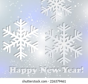 The abstract of the paper cutting. Christmas background. Abstract snowflakes 