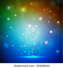 Abstract party background with rainbow colors and colorful particles