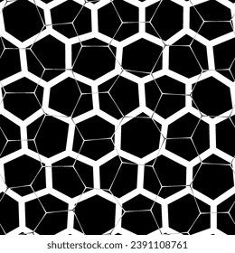 Abstract pattern with a bold black and white honeycomb motif on a black background, featuring a mesh-like design