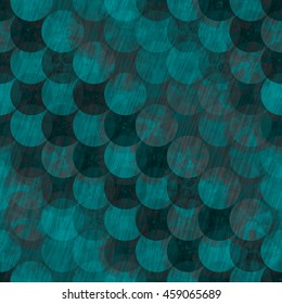 Abstract pattern of circles. Diagonally. Overlapping. Transparency. Strokes. Like armor, chain mail or a stylized fish scales. Grunge texture. Blue-green pattern.