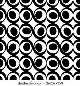 Abstract pattern of circles and dots seamless vector background.