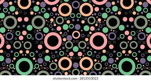 Abstract pattern featuring multicolored circles and rings on a dark background, creating a lively and dynamic visual effect.