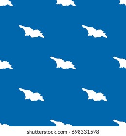 abstract pattern filled with maps of georgia. white silhouettes on blue background