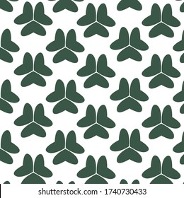 
Abstract pattern. Green shamrocks. Vegetable stylized elements. Wallpaper.
