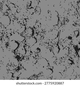 Abstract pattern of irregular black shapes scattered across gray background, textured surface resembling stains, corrosion, or organic material for artistic or design use