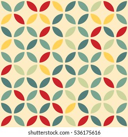 Abstract pattern of the petals on a yellow background. Warm shades. Seamless image.