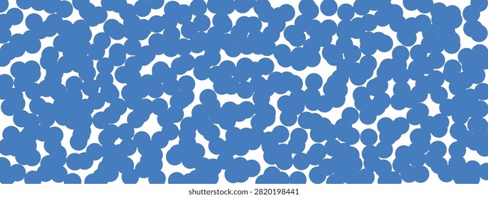 Abstract pattern of randomly scattered blue circles on a bright white background creating a textured effect