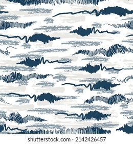 Abstract pattern is seamless composed of digital brush strokes in shades of blue. Ideal for use on fashion fabrics or surfaces.