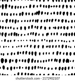 Abstract pattern of small black dots or spots on white. Black small specks in a row vector seamless pattern. Polka dot motif wallpaper. Monochrome hand drawn texture. Sketchy hand-drawn points.