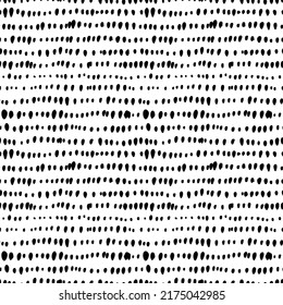 Abstract pattern of small black dots or spots on white. Black small specks in a row vector seamless pattern. Polka dot motif wallpaper. Monochrome hand drawn texture. Sketchy hand-drawn points.