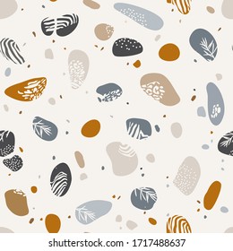 
Abstract pattern with stones and prints. Decorative background with pebbles for surface design