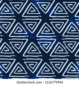 Abstract pattern of triangles. Figures of manual work. Ethnic motif for packaging, wallpaper, tiles