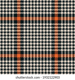 Abstract pattern tweed in black, orange, white for textile print. Seamless herringbone textured glen check plaid background for jacket, coat, skirt, other spring summer autumn fashion fabric design.