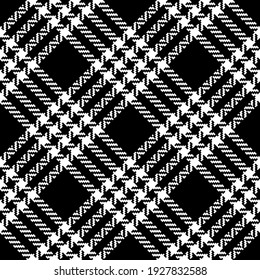 Abstract pattern tweed in black and white for textile design. Dark seamless textured diagonal check background art for dress, jacket, skirt, other trendy everyday autumn winter fashion textile print.