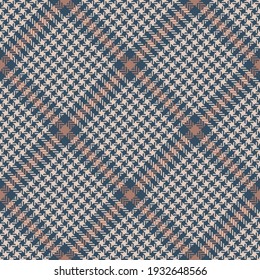 Abstract pattern tweed plaid in blue, brown, beige for textile design. Seamless herringbone textured glen check graphic for jacket, coat, skirt, other spring autumn winter fashion fabric print.