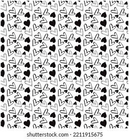 Abstract patterns with black and white hearts.Seamless background with hearts.Valentine's Day.Gift wrap, print, cloth,wallpper,cute background for a card.
