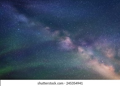 Abstract picture with beautiful starry sky, milky way and Northern lights. Vector background. Can be used as postcard, illustration