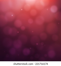 Abstract pink and purple background with blurred bokeh bubbles