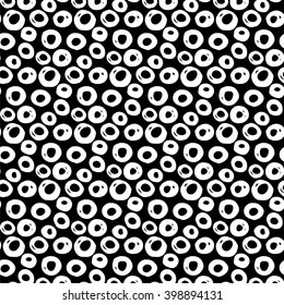 Abstract polka dot pattern with hand drawn dots. Cute vector black and white polka dot pattern. Seamless monochrome polka dot pattern for fabric, wallpapers, wrapping paper, cards and web backgrounds.