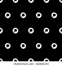 Abstract polka dot pattern with hand drawn dots. Cute vector black and white polka dot pattern. Seamless monochrome polka dot pattern for fabric, wallpapers, wrapping paper, cards and web backgrounds.