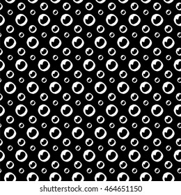 Abstract polka dot pattern with hand drawn dots. Cute vector black and white polka dot pattern. Seamless monochrome polka dot pattern for fabric, wallpapers, wrapping paper, cards and web backgrounds.