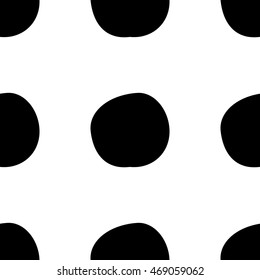 Abstract polka dot pattern with hand drawn dots. Cute vector black and white polka dot pattern. Seamless monochrome doodle polka dot pattern for textile, wallpapers, wrapping paper, cards and web.