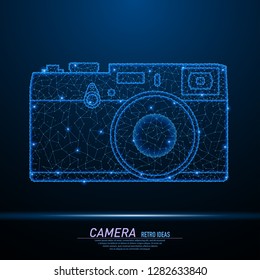 Abstract polygonal light of closeup retro camera. Business wireframe mesh spheres from flying debris. Vintage photo camera concept. Blue structure style vector illustration.