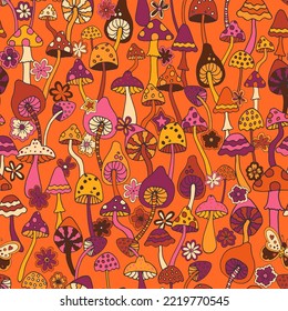 Abstract psychedelic surface pattern design. Colorful retro seamless pattern with hand drawn groovy elements, flowers and mushrooms. Vintage 60s hippie vector background