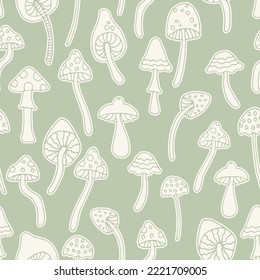 Abstract psychedelic surface pattern design. Retro seamless pattern with hand drawn groovy mushrooms. Vintage 60s hippie vector background