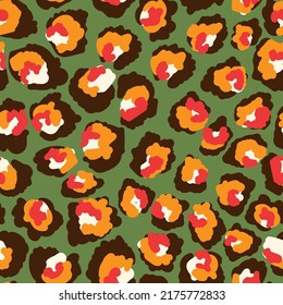 Abstract rainbow leopard seamless vector pattern. Trendy multicolored cartoon texture for prints, fabric, wallpaper, wrapping paper.