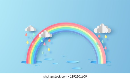 Abstract Rainbow in the rainy season. Paper art design for clouds and rainbow in rain season. paper cut and craft design. vector, illustration.