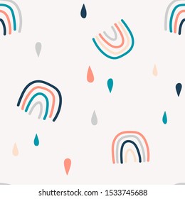 Abstract rainbows hand drawn seamless pattern. Colorful uneven geometric shapes doodle drawing. Rain drops background. Gender neutral nursery backdrop. Decorative textile, wallpaper, wrapping paper