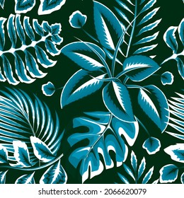 Abstract rainforest vintage colors seamless tropical pattern plants with monochromatic blue fern leaves, monstera, and palm leaf on night background. Jungle foliage illustration. summer