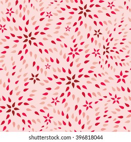 Abstract random drops forming star like shapes. Seamless pattern texture. Shades of red on pink background.