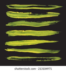 Abstract realistic long straight strokes drawn thick yellow paint on black paper