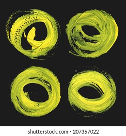 Abstract realistic round strokes drawn thick yellow paint on black background