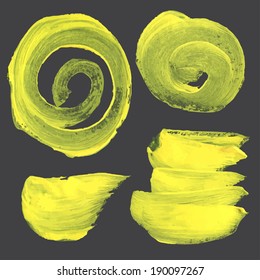 Abstract realistic strokes and circles drawn thick yellow paint on black paper