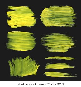 Abstract realistic strokes drawn thick yellow paint on black background 1