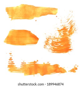 Abstract realistic wet smears orange paint on white paper