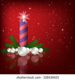 Abstract red background with Christmas decorations and candle