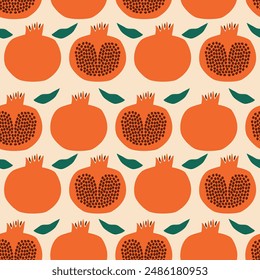 Abstract red pomegranate with green leaves hand drawn vector illustration. Colorful fruit seamless pattern for fabric or wallpaper.