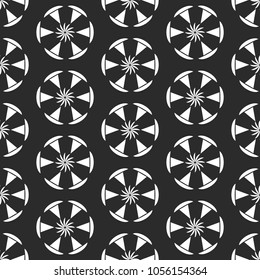 Abstract repeating geometric pattern. Monochrome seamless rounded background.