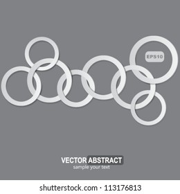 Abstract ring with shadow on gray background