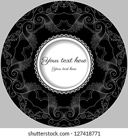 Abstract round frame. Filigree lace pattern. Place for your text. Black, white and gray.