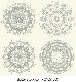 Abstract round ornamental patterns in beige and brown colors