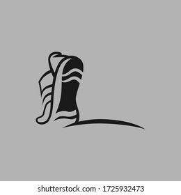 Abstract running shoe symbol on gray backdrop. Design element